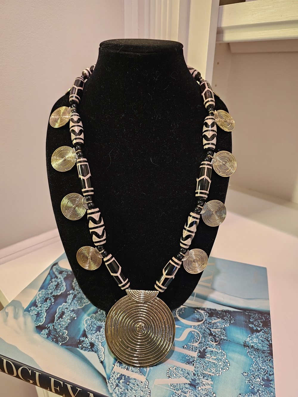 Sassy Jones Black and Gold Spiral Medallion Necklace